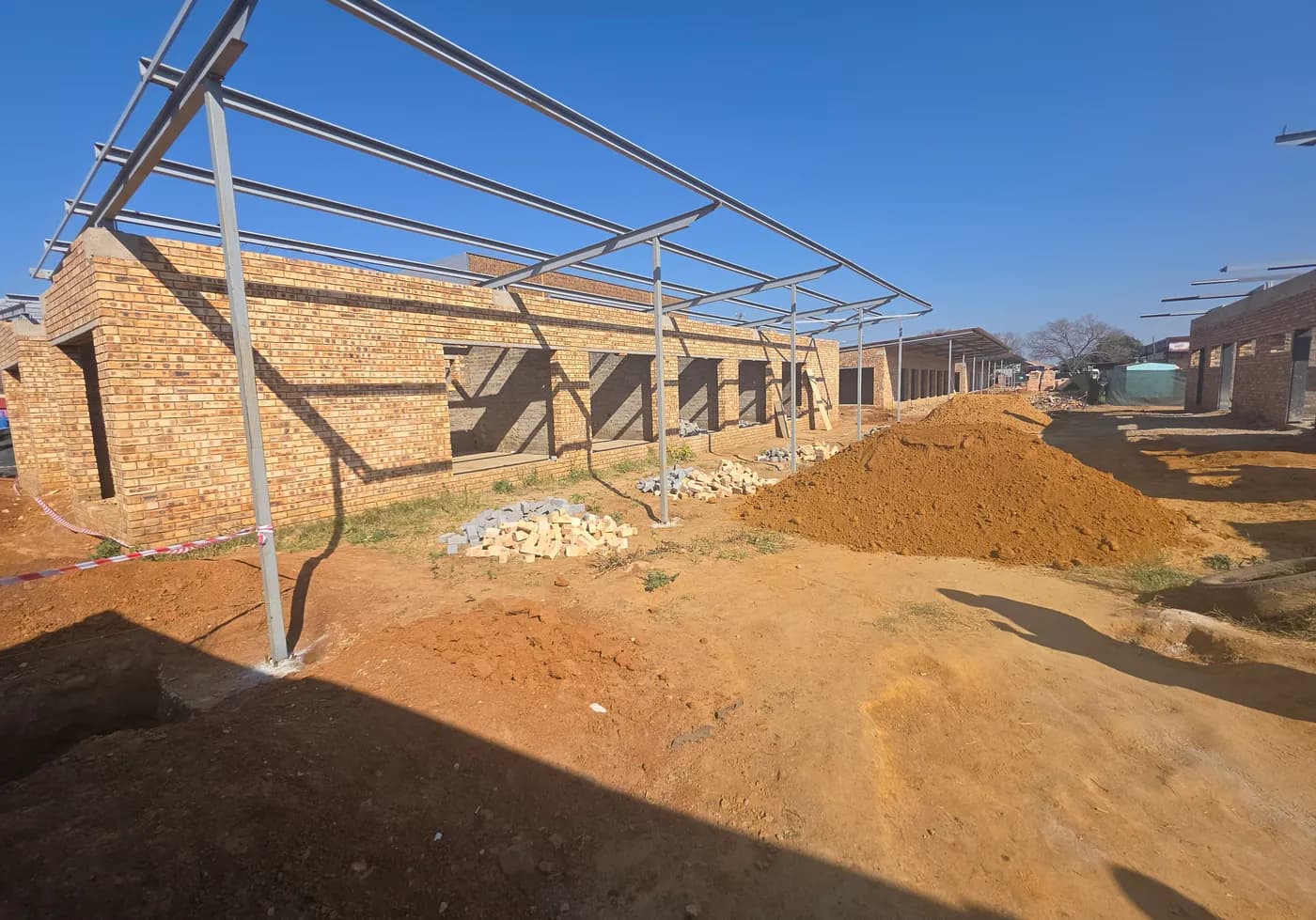 Roof trusses going up