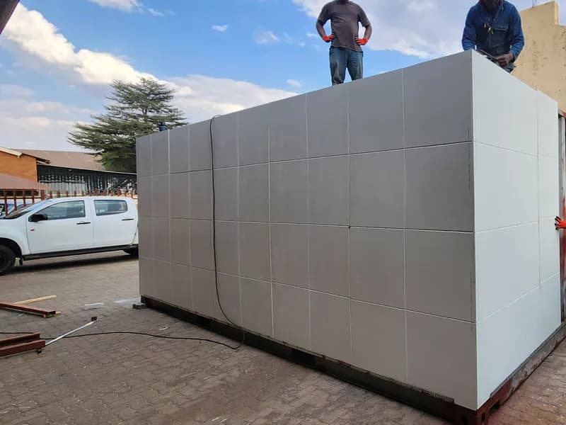 Cladding panels going on