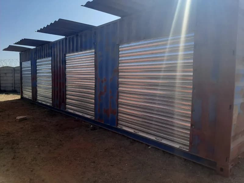 Roller shutters under a new roof overhang