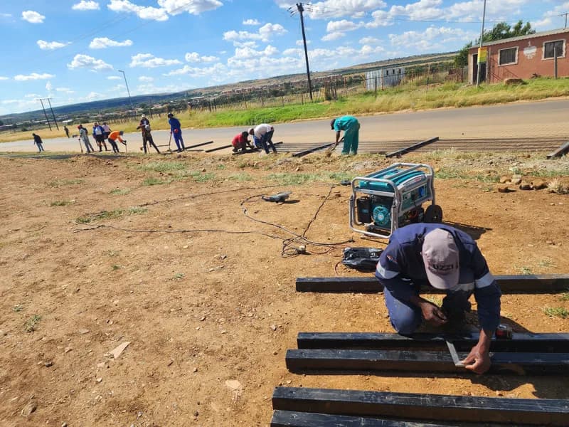 Preparing steel fence posts on site